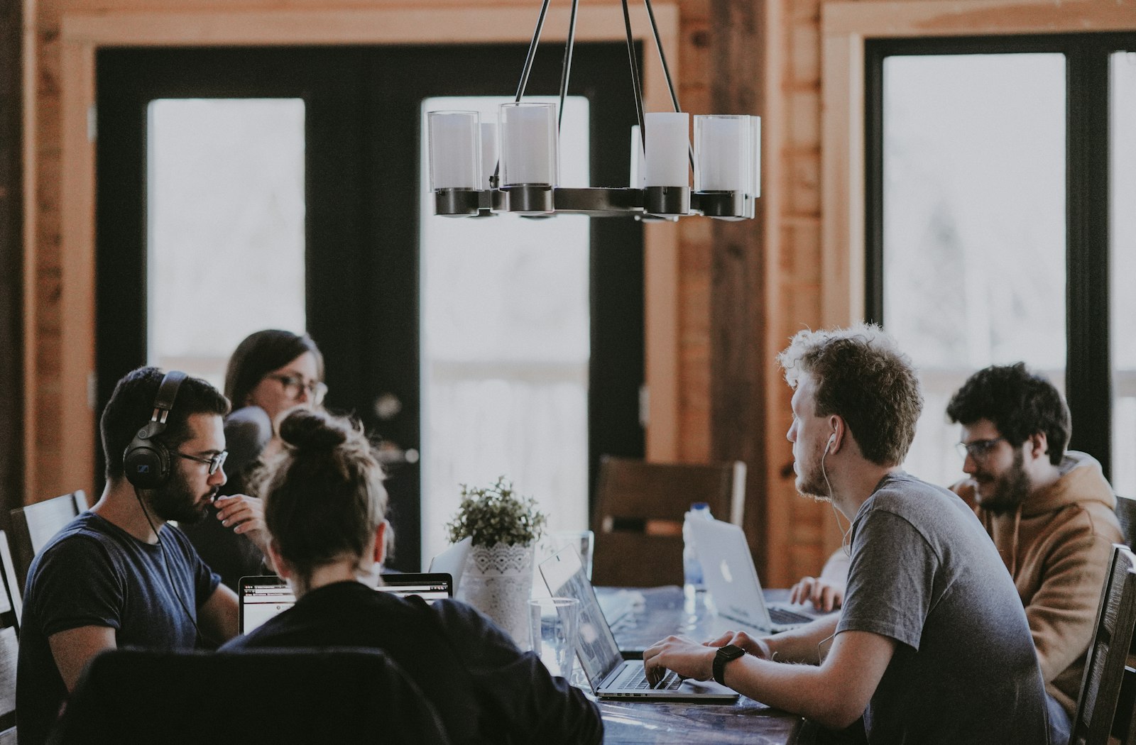 What missed calls really cost your HVAC company Team reviewing missed-call revenue numbers on a laptop with call reports spread on the desk